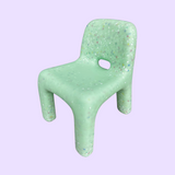 colourful, textured children's chair that is MINT / light pastel green colour and has multi coloured speckles throughout