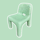 Green textured chair on a light green background