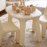 Decorative item with intricate patterns on a textured surface